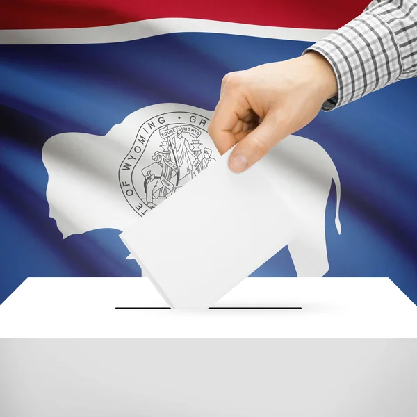 Ballot box with US state flag on background - Wyoming — Stock Photo, Image