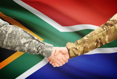 Arka plan - Güney Afrika bayrak elini sıkarken üniformalı erkekler