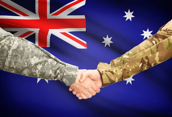 男子在均匀背景-澳大利亚国旗握手 — 图库照片