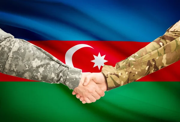 Men in uniform shaking hands with flag on background - Azerbaijan — Stock Photo, Image