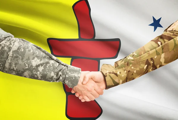 Military handshake and Canadian province flag - Nunavut — Stock Photo, Image