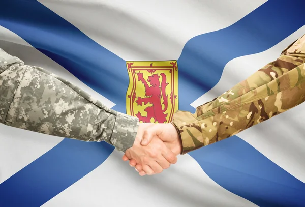 Military handshake and Canadian province flag - Nova Scotia — Stock Photo, Image