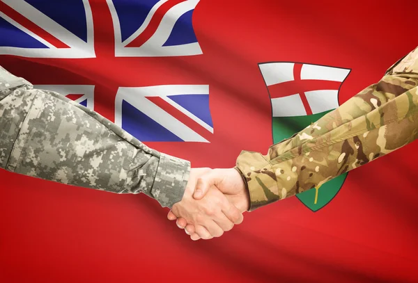 Poignée de main militaire et drapeau de la province du Canada - Ontario — Photo