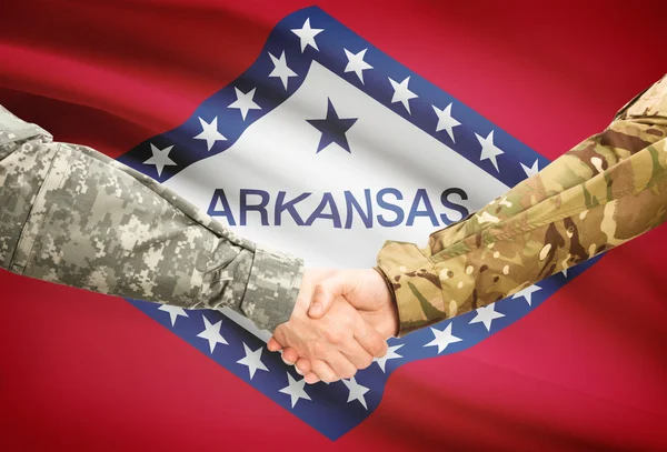 Military handshake and US state flag - Arkansas — Stock Photo, Image