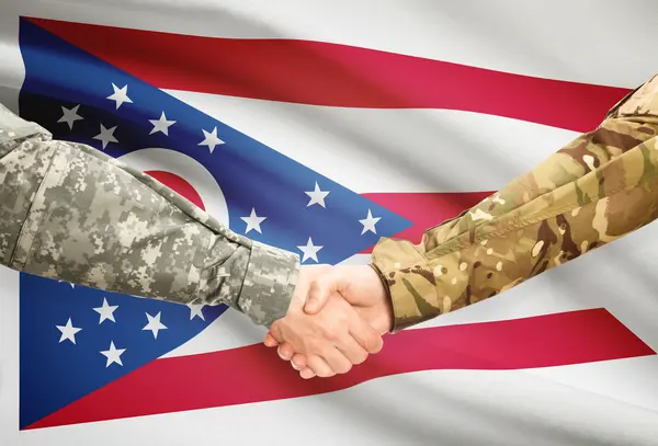 Military handshake and US state flag - Ohio — Stock Photo, Image