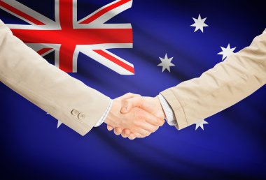 Arka plan - Avustralya bayrağı ile işadamları el sıkışma