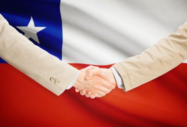 Arka plan - Şili bayrağı ile işadamları el sıkışma