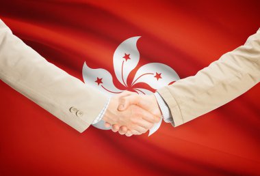 Arka plan - Hong Kong bayrağı ile işadamları el sıkışma