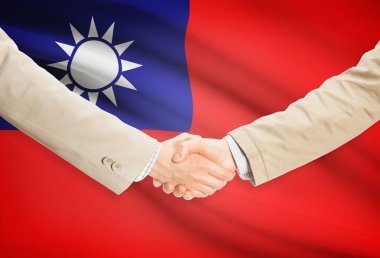 Arka plan - Çin - Tayvan bayrağı ile işadamları el sıkışma