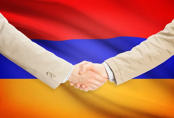 Poignée d'hommes d'affaires avec le drapeau sur fond - Arménie — Photo