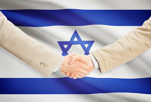 Unternehmer-Handshakes mit Flagge auf Hintergrund - Israel — Stockfoto