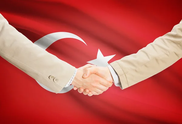 Businessmen handshake with flag on background - Turkey — Stock Photo, Image