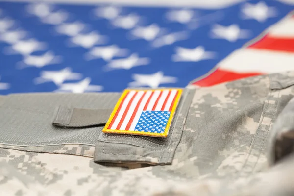 New USA army uniform over flag - focus on stripe — Stock Photo, Image