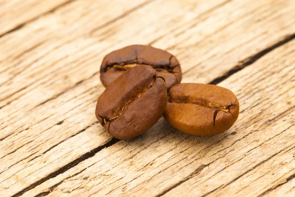 Coffee beans on table - close up shot — Stock Photo, Image