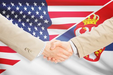 İşadamları el sıkışma - Amerika Birleşik Devletleri ve Sırbistan