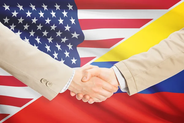 Unternehmer-Handshake - USA und Kolumbien — Stockfoto