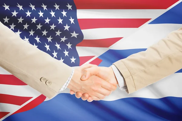 Zakenlieden handdruk - Verenigde Staten en Cuba — Stockfoto