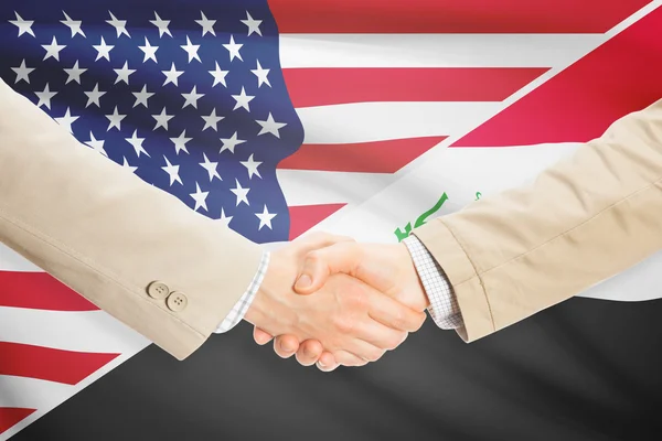 Businessmen handshake - United States and Iraq — Stock Photo, Image