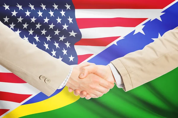 Businessmen handshake - United States and Solomon Islands — Stock Photo, Image