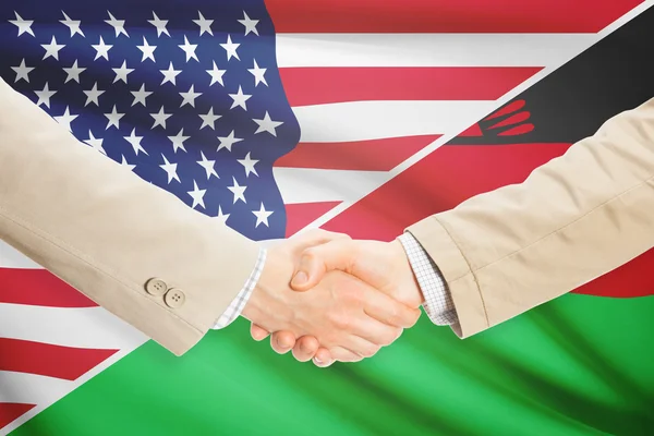 Podnikatelé handshake - Malawi a Spojené státy americké — Stock fotografie
