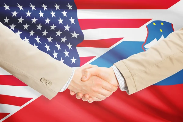 Businessmen handshake - United States and Slovenia — Stock Photo, Image