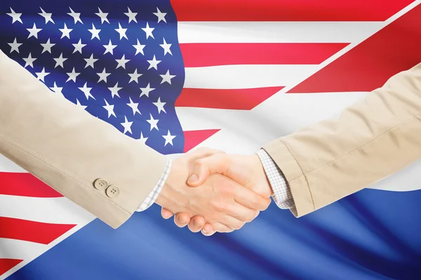 Businessmen handshake - United States and Netherlands — Stock Photo, Image