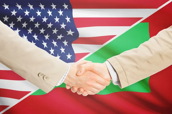 Podnikatelé handshake - USA a Maledivy — Stock fotografie