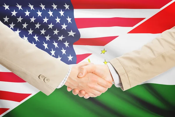 Stretta di mano degli uomini d'affari - Stati Uniti d'America e Tagikistan — Foto Stock