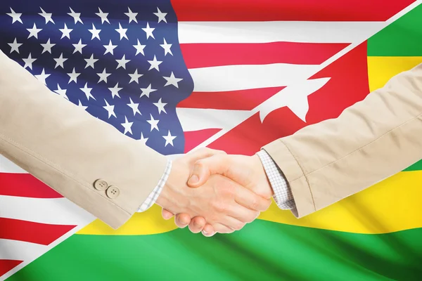 Podnikatelé handshake - USA a Togo — Stock fotografie