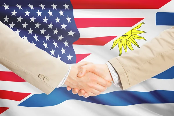 Poignée de main hommes d'affaires - États-Unis et l'Uruguay — Photo