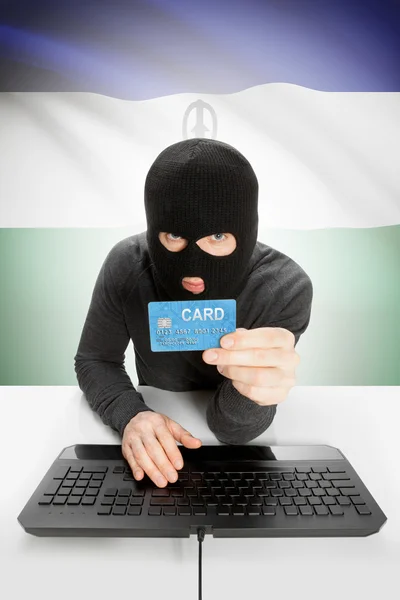 Cybercrime concept with national flag on background - Lesotho — Stock Photo, Image