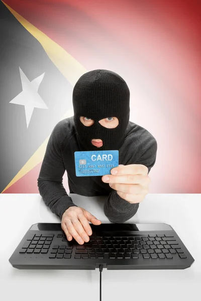 Cybercrime concept with national flag on background - East Timor —  Fotos de Stock