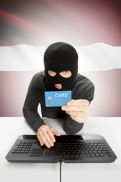 Cybercrime concept with national flag on background - Latvia — Stock Photo, Image