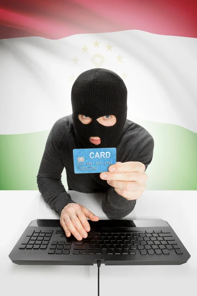 Cybercrime concept with national flag on background - Tajikistan —  Fotos de Stock