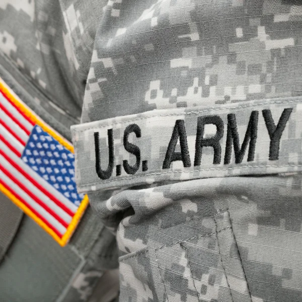 US Army and flag patch on military uniform - studio shot — Stock Photo, Image