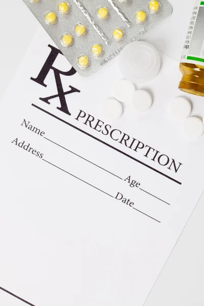 Medical drug prescription and pills over it - studio shot — Stok fotoğraf