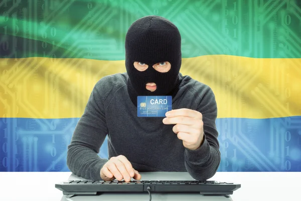 国旗上的背景-加蓬与网络犯罪概念的 — 图库照片