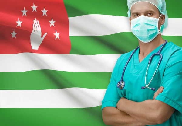 Surgeon with flag on background series - Abkhazia — Stock Photo, Image
