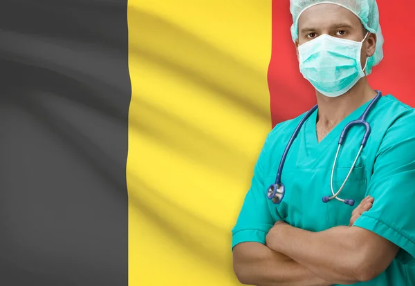 Хирург с флагом на фоне серии - Бельгия — стоковое фото