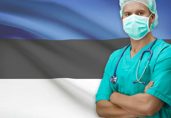 Surgeon with flag on background series - Estonia – stockfoto