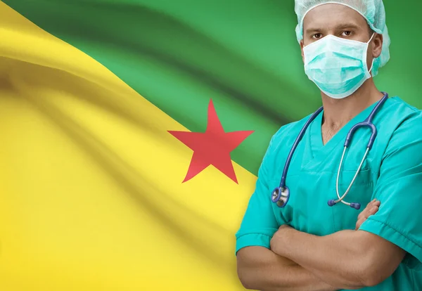 Surgeon with flag on background series - French Guiana — Stock Photo, Image