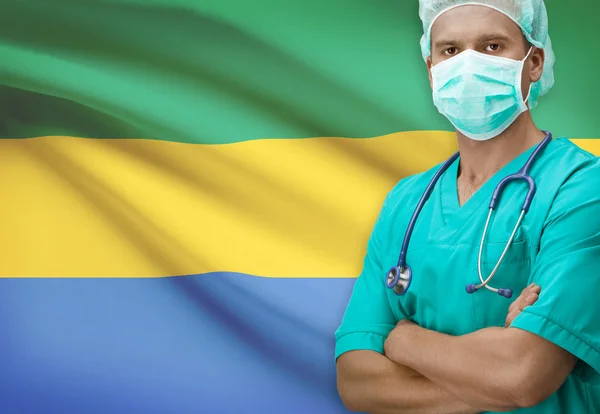 Surgeon with flag on background series - Gabon — Stock Photo, Image