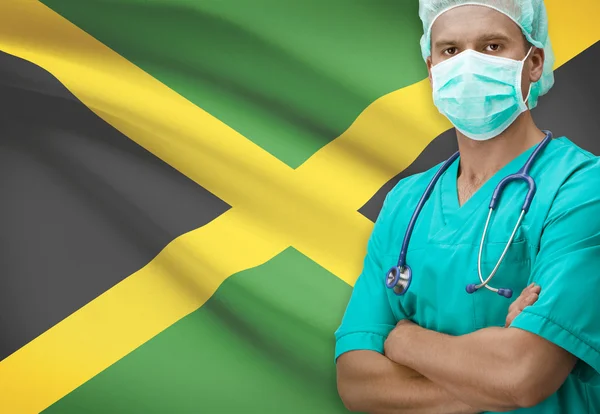 Хирург с флагом на фоне серии - Ямайка — стоковое фото