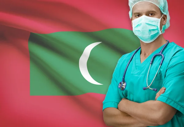 Surgeon with flag on background series - Maldives — Stock Photo, Image