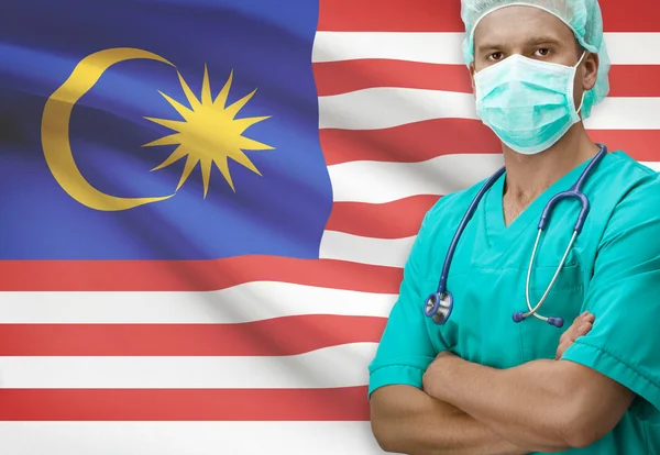 Surgeon with flag on background series - Malaysia — Stock Photo, Image