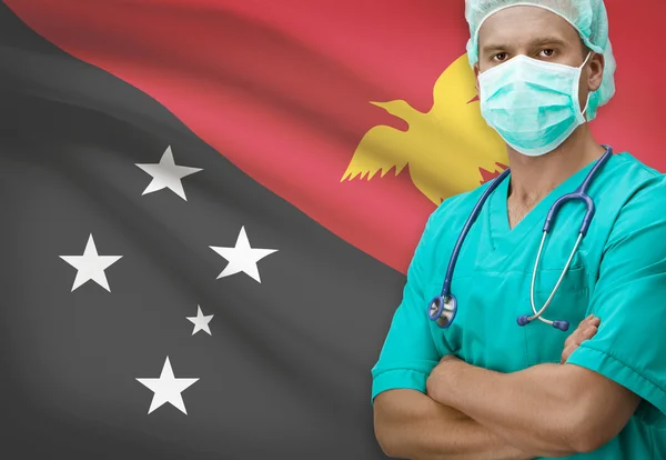 Хирург с флагом на фоне серии - Папуа-Новая Гвинея — стоковое фото
