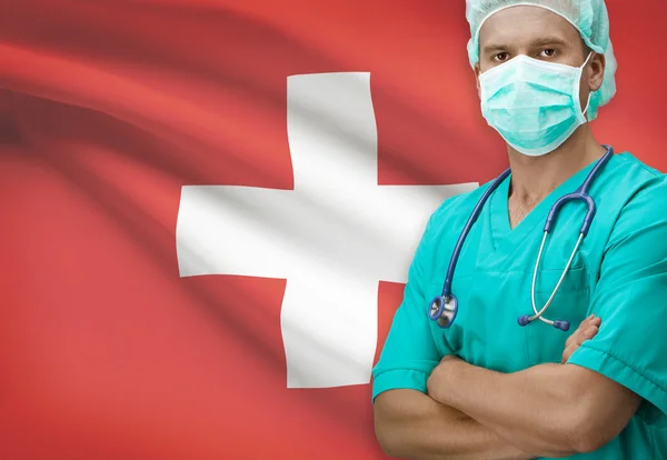 Surgeon with flag on background series - Switzerland — Stock Photo, Image