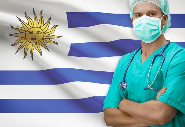 Surgeon with flag on background series - Uruguay — Stock Photo, Image