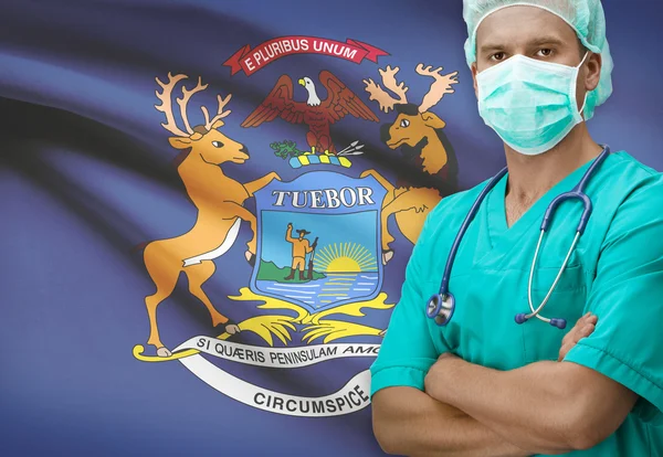 Surgeon with US states flags on background series - Michigan — Stock Photo, Image