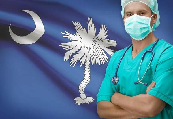 Surgeon with US states flags on background series - South Carolina — Stok fotoğraf